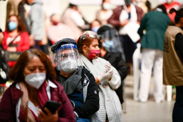 (210223) -- ECATEPEC, Feb. 23, 2021 -- Citizens wait in line to receive the COVID-19 vaccines developed by Chinese pharmaceutical company Sinovac at a vaccination site in Ecatepec, Mexico, Feb. 22, 2021. Mexican health authorities on Monday began to vaccinate older adults with a COVID-19 vaccine developed by Chinese pharmaceutical company Sinovac, after a shipment of doses arrived on Saturday. Mexico s government designated the first shipment of the Sinovac vaccine to arrive in Ecatepec, a city in central State of Mexico that lies on the outskirts of the capital Mexico City. Early in the day, brigades of healthcare workers began to administer the vaccine to hundreds of residents aged 60 and over who went to the Las Americas cultura 