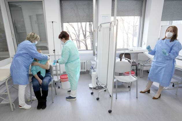Vaccination in Zagreb, Croatia A woman receive coronavirus disease (COVID-19) vaccine during a mass vaccination in Zagreb, Croatia on February 23, 2021 PatrikxMacek PIXSELL