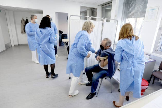 Vaccination in Zagreb, Croatia A man receive coronavirus disease (COVID-19) vaccine during a mass vaccination in Zagreb, Croatia on February 23, 2021 PatrikxMacek PIXSELL