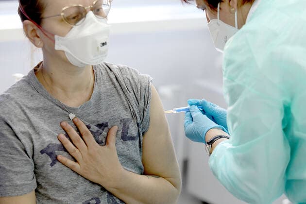 Vaccination in Zagreb, Croatia A woman receive coronavirus disease (COVID-19) vaccine during a mass vaccination in Zagreb, Croatia on February 23, 2021 PatrikxMacek PIXSELL