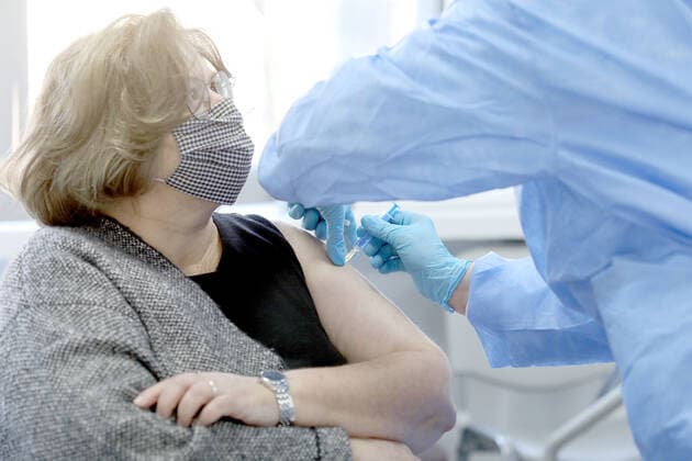Vaccination in Zagreb, Croatia A woman receive coronavirus disease (COVID-19) vaccine during a mass vaccination in Zagreb, Croatia on February 23, 2021 PatrikxMacek PIXSELL