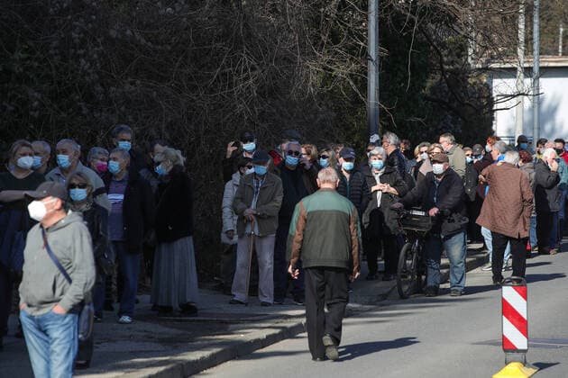 Vaccination in Zagreb, Croatia People wait in line to receive coronavirus disease (COVID-19) vaccine during a mass vaccination in Zagreb, Croatia on February 23, 2021. SanjinxStrukic PIXSELL