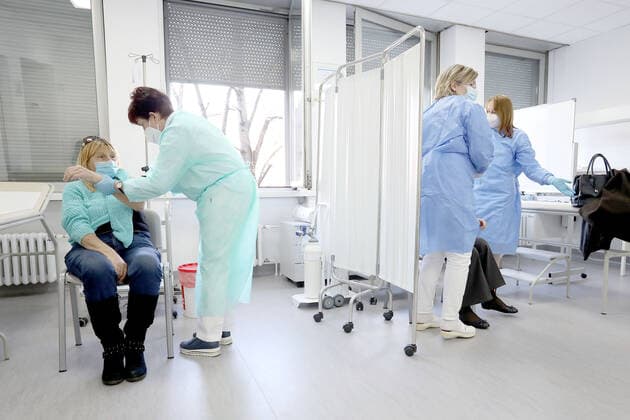 Vaccination in Zagreb, Croatia A woman receive coronavirus disease (COVID-19) vaccine during a mass vaccination in Zagreb, Croatia on February 23, 2021 PatrikxMacek PIXSELL