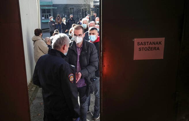Vaccination in Zagreb, Croatia People wait in line to receive coronavirus disease (COVID-19) vaccine during a mass vaccination in Zagreb, Croatia on February 23, 2021. SanjinxStrukic PIXSELL