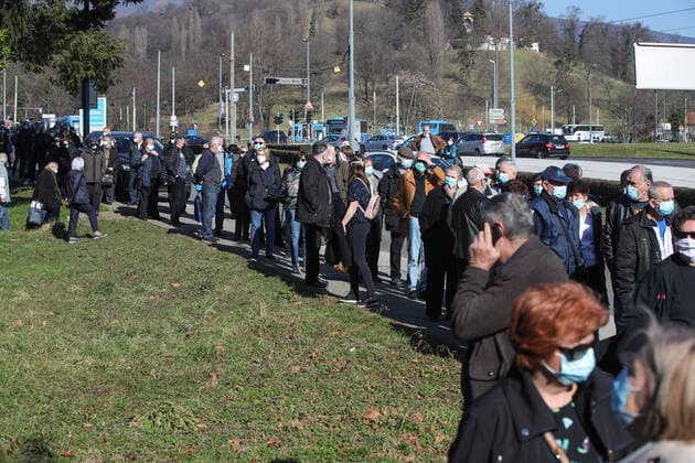 Vaccination in Zagreb, Croatia People wait in line to receive coronavirus disease (COVID-19) vaccine during a mass vaccination in Zagreb, Croatia on February 23, 2021. SanjinxStrukic PIXSELL