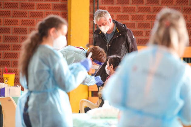 Vaccination in Zagreb, Croatia A woman receive coronavirus disease (COVID-19) vaccine during a mass vaccination in Zagreb, Croatia on February 23, 2021. SanjinxStrukic PIXSELL