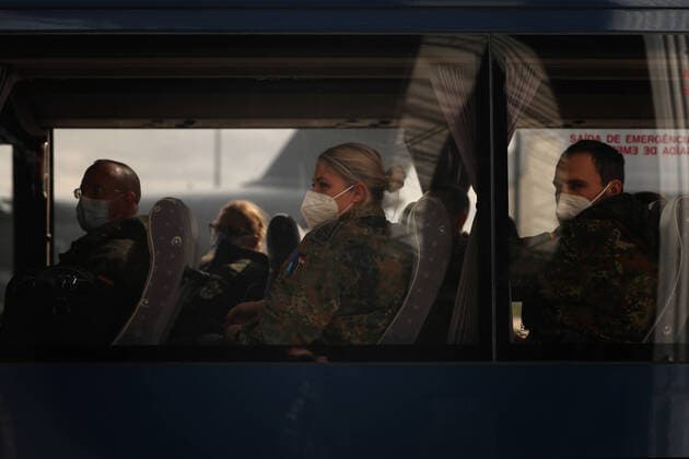 February 23, 2021, Lisbon, Portugal: German army medical experts are seen in a bus at Figo Maduro military airbase in Lisbon, Portugal on February 23, 2021. Based on a bilateral agreement, a second team of German army medical experts arrived in Portugal on Tuesday to replace the team that has been in Portugal since February 3 to assist the country in its fight against the COVID-19 pandemic. Lisbon Portugal - ZUMAf123 20210223_zap_f123_003 Copyright: xPedroxFiuzax
