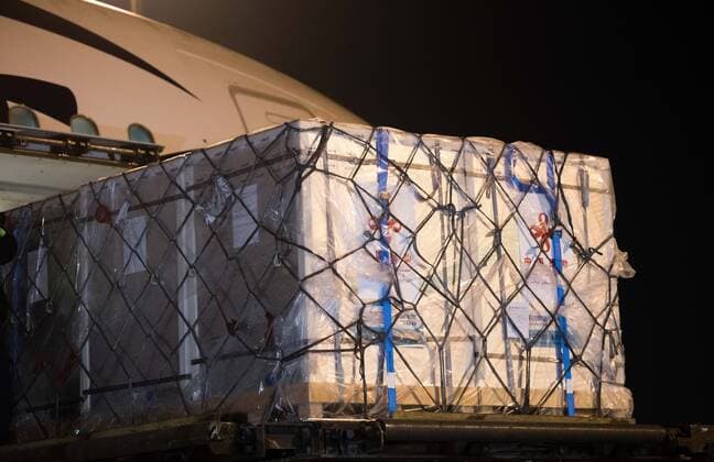 (210223) -- CAIRO, Feb. 23, 2021 -- A batch of China s Sinopharm COVID-19 vaccines are seen in Cairo International Airport, Egypt, Feb. 23, 2021. The shipment of COVID-19 vaccines from Chinese company Sinopharm arrived in Egyptian capital Cairo on Tuesday. ) EGYPT-CAIRO-CHINA-VACCINE-ARRIVAL WuxHuiwo 