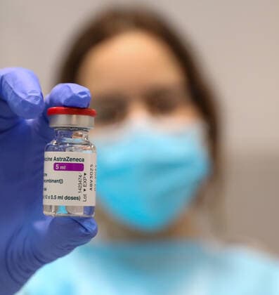 A health professional holds a vial with the vaccine against COVID-19 from AstraZeneca, in the Pavilion 3 of the Public Hospital Enfermera Isabel Zendal, in Madrid, (Spain), on February 23, 2021. This Tuesday begins the vaccination in the pavilion 3 of the hospital with the vaccine of AstraZeneca to 400 people of External Health, AENA, inspectors of Public Health, of Institute of Social Security, professionals of reformatories, Forensic Doctors, Students of CC Health and veterinarians. These new groups to be vaccinated will be joined by those over 80 years of age on Thursday 25 February in the Primary Care centres of each of the health areas of the community with 50,000 doses. 23 FEBRUARY 2021;ISABEL DÃAZ AYUSO;AYUSO;MADRID;COMMUNITY OF MAD Copyright: xLagenciaEPxPRESS M.FERNÃNDEZ.xPOOLx 3576561