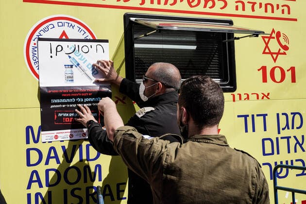 February 24, 2021, Jerusalem, Israel: The IDF Home Front Command in coordination with Magen David Adom, serving as the Israeli Red Cross organization and leading EMS, make COVID-19 vaccinating more accessible to those still in denial or refusal operating a mobile vaccination station out of a caravan at JerusalemÃ¢â‚¬â ¢s Shuk Mahane Yehuda Market. Jerusalem Israel - ZUMAa126 20210224_zap_a126_002 Copyright: xNirxAlonx