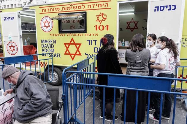 February 24, 2021, Jerusalem, Israel: The IDF Home Front Command in coordination with Magen David Adom, serving as the Israeli Red Cross organization and leading EMS, make COVID-19 vaccinating more accessible to those still in denial or refusal operating a mobile vaccination station out of a caravan at JerusalemÃ¢â‚¬â ¢s Shuk Mahane Yehuda Market. Jerusalem Israel - ZUMAa126 20210224_zap_a126_017 Copyright: xNirxAlonx