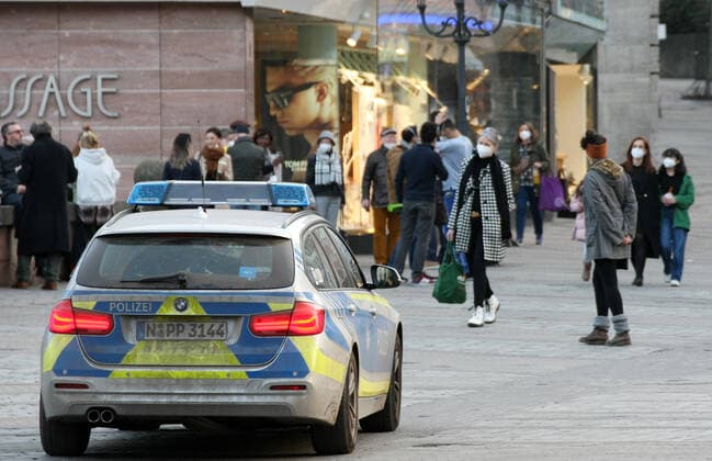 Polizei make a Kontrolle about the Mask use during the Hard Lockdown of the Covid 19 Coronavirus Pandemie in Nurnberg , Bayern , Deutschland . February 24, 2021.