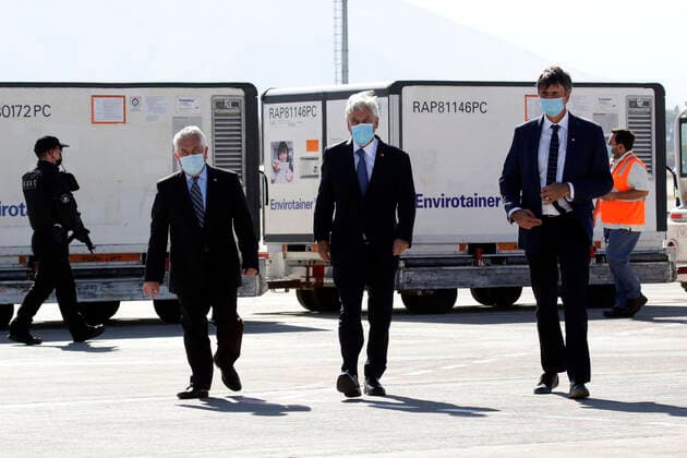 Santiago 25 February 2021 The President of the Republic Sebastian Pinera accompanied by Health Minister Enrique Pairis and Science Minister Andres Couve receive third shipment of Sinovac vaccine against Covid 19, at Arturo Merino Benitez airport Javier Salvo Aton Chile, Santiago Chile Aton Chile 490929  Copyright: JAVIERxSALVO ATONCHILE