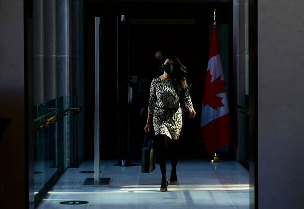 February 26, 2021, Ottawa, on, Canada: Dr. Supriya Sharma, chief medical adviser at Health Canada, and Dr. Marc Berthiaume, director of the bureau of medical sciences, make their way to hold a press conference in Ottawa on Friday, Feb. 26, 2021, to provide an update on the COVID-19 pandemic and vaccine rollout in Canada. Ottawa Canada  - ZUMAc35_ 20210226_zaf_c35_006 Copyright: xSeanxKilpatrickx
