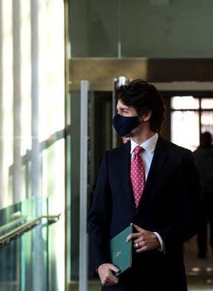 February 26, 2021, Ottawa, on, Canada: Prime Minister Justin Trudeau makes his way to hold a press conference in Ottawa on Friday, Feb. 26, 2021, to provide an update on the COVID-19 pandemic and vaccine roll-out in Canada. Ottawa Canada  - ZUMAc35_ 20210226_zaf_c35_020 Copyright: xSeanxKilpatrickx