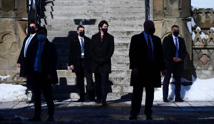 February 26, 2021, Ottawa, on, Canada: Prime Minister Justin Trudeau makes his way to hold a press conference in Ottawa on Friday, Feb. 26, 2021, to provide an update on the COVID-19 pandemic and vaccine roll-out in Canada. Ottawa Canada  - ZUMAc35_ 20210226_zaf_c35_026 Copyright: xSeanxKilpatrickx