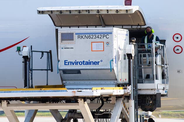 (210227) -- KUALA LUMPUR, Feb. 27, 2021 -- The first batch of COVID-19 vaccines made by the Chinese biopharmaceutical company Sinovac Biotech is unloaded upon its arrival at the Kuala Lumpur International Airport in Sepang, Malaysia, Feb. 27, 2021. The first batch of COVID-19 vaccines made by the Chinese biopharmaceutical company Sinovac Biotech arrived in Malaysia on Saturday, boosting the country s capability in the fight against the pandemic. ) MALAYSIA-COVID-19-CHINA-VACCINES-ARRIVAL ZhuxWei 