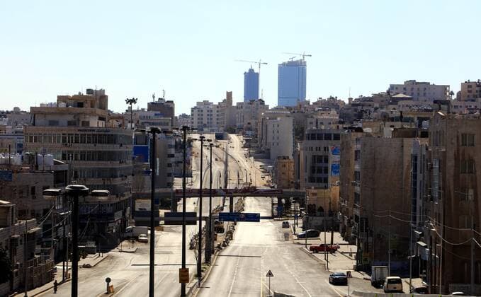 (210227) -- AMMAN, Feb. 27, 2021 -- Photo taken on Feb. 26, 2021 shows empty streets in Amman, Jordan. Jordan on Wednesday decided to reinstate curfew on each Friday starting from Feb. 26 in addition to extending daily curfew by two hours as part of anti-pandemic measures as infections keep rising in the kingdom. During a press conference on Wednesday, Minister of State for Media Affairs Ali Al Ayed announced that businesses are allowed to operate until 9 p.m. local time while public movement will be permitted from 6 a.m. until 10 p.m. as of Thursday. (Photo by Xinhua) JORDAN-AMMAN-COVID-19-CURFEW MohammadxAbuxGhosh 