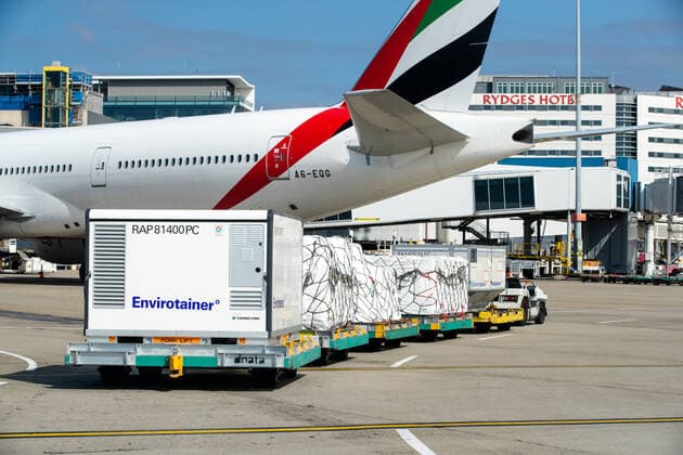 The first Australian shipment of AstraZeneca COVID-19 vaccines is seen after landing at Sydney International Airport, Sunday, February 28, 2021. 300,000 doses of the University of Oxford AstraZeneca COVID-19 vaccine have arrived in Sydney today. (AAP Image Edwina Pickles) NO ARCHIVING Sydney Australia