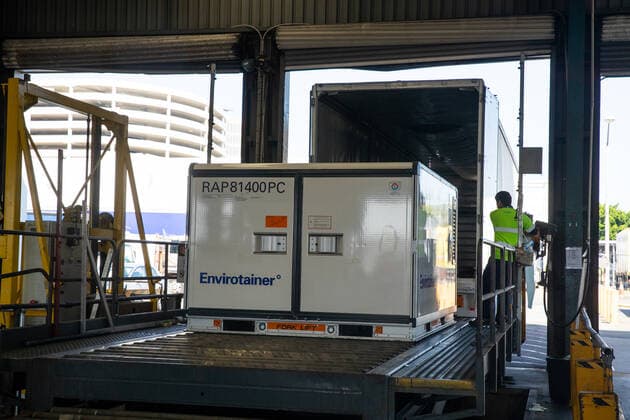 The first Australian shipment of AstraZeneca COVID-19 vaccines is seen after landing at Sydney International Airport, Sunday, February 28, 2021. 300,000 doses of the University of Oxford AstraZeneca COVID-19 vaccine have arrived in Sydney today. (AAP Image Edwina Pickles) NO ARCHIVING Sydney Australia