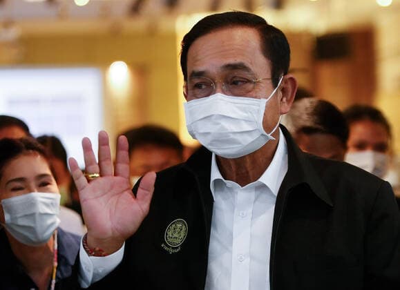 February 28, 2021, Bangkok, Thailand: Thailand s Prime Minister Prayuth Chan-ocha, waves to media at Bamrasnaradura Infectious Diseases Institute during the vaccination..Thailand carries out its first Covid-19 vaccine campaign using the China™s Sinovac vaccine administered to frontline health workers at the Bamrasnaradura Infectious Diseases Institute in Bangkok. Bangkok Thailand - ZUMAs197 20210228_zaa_s197_016 Copyright: xChaiwatxSubprasomx