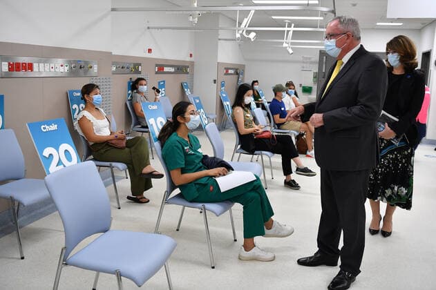 GLADYS BEREJIKLIAN COVID19 VACCINATION HUB TOUR, NSW Health Minister Brad Hazzard speaks with patients after they received their COVID-19 vaccinations during a tour of the Westmead Hospital Vaccination Hub in Sydney, Monday, March 1, 2021. Phase 1a of the nation-wide vaccination program began last week, with healthcare and border workers the first to be vaccinated. ( NO ARCHIVING, EDITORIAL USE ONLY, NO USE IN BOOKS WITHOUT CONSENT SYDNEY NSW AUSTRALIA  Copyright: xDEANxLEWINSx 20210301001523892061