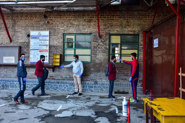 March 1, 2021, Srinagar, India: Students maintain social distance in the school premises as the schools reopened one year of break due to the coronavirus pandemic in Srinagar..The schools in Kashmir have reopened for students of classes 9 to 12 after being shut down for nearly one year due to the coronavirus pandemic. Even before the Covid-19 forced their closure, the educational institutes remained closed for nearly a year on of the security and communication clampdown following the abrogation of Article 370 on 5 August 2019. Meanwhile, Jammu and Kashmir recorded 97 new Covid-19 cases taking the infection tally to 1,26,383, officials said. Srinagar India - ZUMAs197 20210301_zaa_s197_048 Copyright: xSaqibxMajeedx