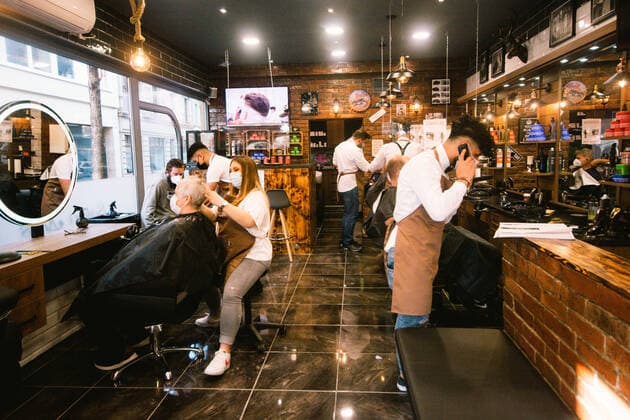 (210301) -- COLOGNE, March 1, 2021 -- Employees serve customers at a hair salon amid COVID-19 pandemic in Cologne, Germany, March 1, 2021. Hair salons in Germany reopened on Monday with COVID-19 prevention measures. (Photo by Xinhua) GERMANY-COLOGNE-COVID-19-HAIR SALON-REOPENING TangxYing 