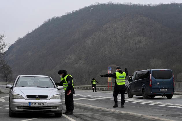 A total of 3,834 soldiers and 270 customs officers will help police check the observance of the new anti-epidemic restrictions in Czechia as of Tuesday, while altogether 30,000 will be deployed for this purpose. Pictured police control on the road in Zbraslav, Prague, Czech Republic, March 1, 2021. (CTKxPhoto OndrejxDeml) CTKPhotoP202103010615401  dml 011K