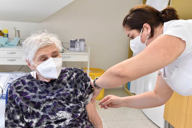 An elderly woman receives a vaccine against the covid-19 at the surgery office in Moravska Nova Ves in Breclav region, Czech Republic, March 1, 2021. (CTKxPhoto VaclavxSalek) CTKPhotoP202103010745701  sal 03
