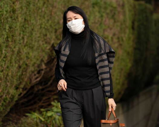 March 1, 2021, Vancouver, BC, Canada: Meng Wanzhou, chief financial officer of Huawei, leaves her home in Vancouver to attend a court hearing, Monday, March 1, 2021. Vancouver Canada  - ZUMAc35_ 20210301_zaf_c35_029 Copyright: xJonathanxHaywardx