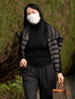 March 1, 2021, Vancouver, BC, Canada: Meng Wanzhou, chief financial officer of Huawei, leaves her home in Vancouver to attend a court hearing, Monday, March 1, 2021. Vancouver Canada  - ZUMAc35_ 20210301_zaf_c35_034 Copyright: xJonathanxHaywardx
