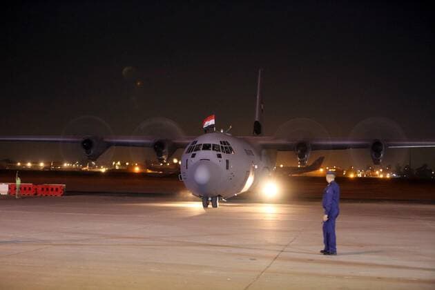 (210302) -- BAGHDAD, March 2, 2021 -- A plane carrying the COVID-19 vaccines donated by China arrives at an airbase in Baghdad, Iraq on March 2, 2021. Iraq received a shipment of China s COVID-19 vaccines on Tuesday. ) IRAQ-BAGHDAD-COVID-19-CHINA-VACCINES-ARRIVAL KhalilxDawood 