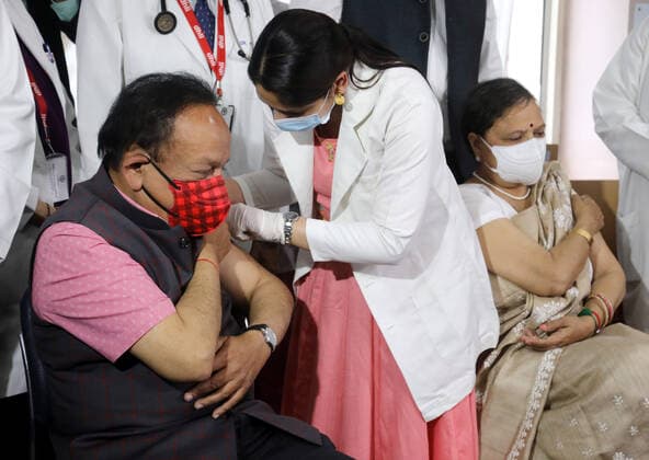 March 2, 2021, New Delhi, India: Indian Health Minister Dr. Harsh Vardhan receiving the first dose of Covid-19 vaccine COVAXIN during the second phase of the countrywide vaccination drive at Delhi Heart and Lung Institute..Health Minister said every beneficiary should get their second dose after 28 days of first dose after getting vaccinated. COVAXIN is the India first indigenous COVID-19 vaccine developed by Bharat Biotech. New Delhi India - ZUMAs197 20210302_zaa_s197_058 Copyright: xNaveenxSharmax