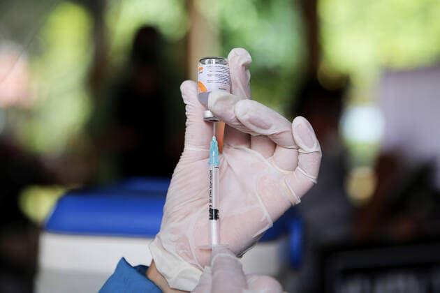 March 2, 2021, Jakarta, Indonesia: A healthcare worker prepares for a shot of Sinovac s COVID-19 vaccine..Mass vaccination for elderly at the school amid the coronavirus disease (COVID-19) in Jakarta. Jakarta Indonesia - ZUMAs197 20210302_zaa_s197_071 Copyright: xAslamxIqbalx