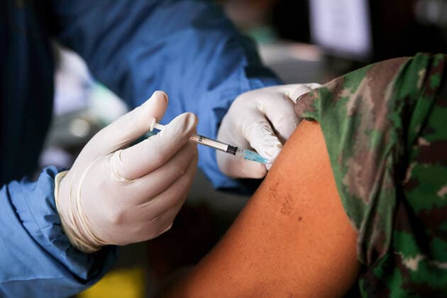 March 2, 2021, Jakarta, Indonesia: An elderly receives a shot of Sinovac s COVID-19 vaccine..Mass vaccination for elderly at the school amid the coronavirus disease (COVID-19) in Jakarta. Jakarta Indonesia - ZUMAs197 20210302_zaa_s197_072 Copyright: xAslamxIqbalx