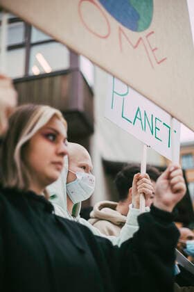 Female protestor participating in social movement for environmental issues during pandemic Sweden, Stockholm, model released, property released Copyright: xMaskotx , MA84415