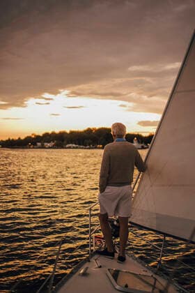 Rear view of senior man admiring sea during sunset Sweden, Stockholm, model released, property released Copyright: xMaskotx , MA84516