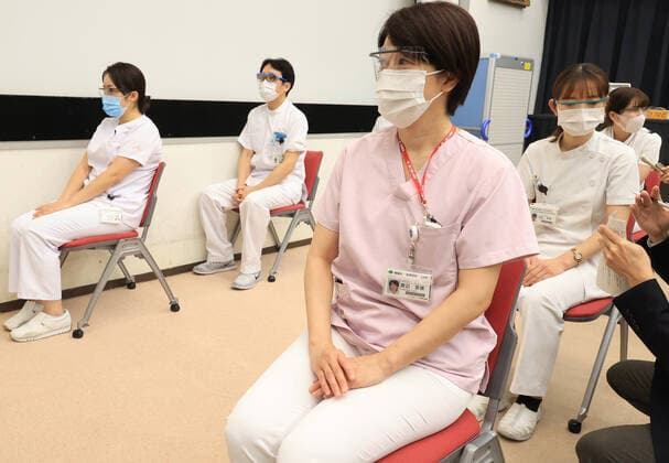 March 5, 2021, Tokyo, Tokyo, Japan: Medical workers rest after they received doses of COVID-19 vaccine at the Tokyo Metropolitan Cancer and Infectious Diseases Center Komagome Hospital in Tokyo on March 5, 2021. Japanese government will extend the COVID-19 state of emergency for two weeks. Tokyo Japan - ZUMAz114 20210305_zih_z114_009 Copyright: xPOOLx