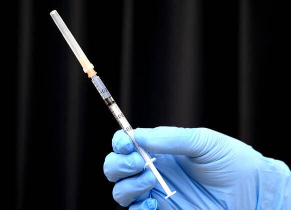 March 5, 2021, Tokyo, Tokyo, Japan: A syringe with COVID-19 vaccine is displayed as medical workers receive doses of COVID-19 vaccine at the Tokyo Metropolitan Cancer and Infectious Diseases Center Komagome Hospital in Tokyo on March 5, 2021. Japanese government will extend the COVID-19 state of emergency for two weeks. Tokyo Japan - ZUMAz114 20210305_zih_z114_011 Copyright: xPOOLx