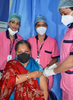 COVID-19 Vaccination Drive In Rajasthan, India National Vice President of BJP and former chief minister Vasundhara Raje being administered the COVID-19 vaccine, during a countrywide inoculation drive, at SMS Hospital in Jaipur. The second phase of the COVID-19 vaccination drive started for people 60 years of age and above. Jaipur Rajasthan India Copyright: SumitxSaraswat