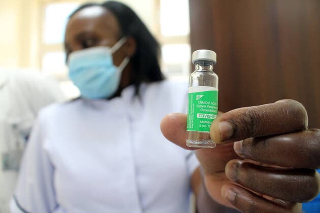 (210306) -- NAIROBI, March 6, 2021 -- A nurse shows a dose of the AstraZeneca COVID-19 vaccine at Kenyatta National Hospital in Nairobi, Kenya, March 5, 2021. Kenya s health ministry on Friday kicked off COVID-19 vaccination campaign with frontline health workers as the first to receive the vaccine. (Photo by Xinhua) KENYA-NAIROBI-COVID-19-VACCINATION JoyxNabukewa 