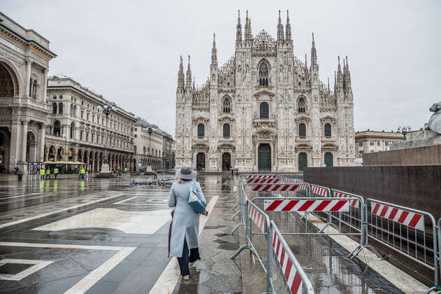 Milan. Dark Orange Zone few people in the street through the streets of the center Editorial Usage Only  Copyright: xCarloxCozzolix xIPAx