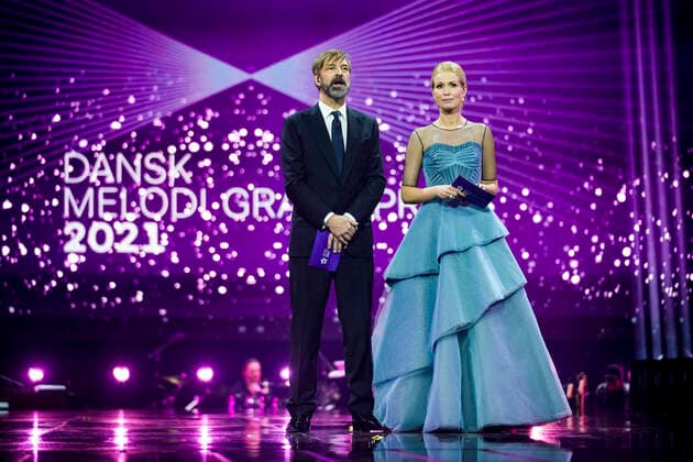 Bilder des Jahres 2021, Entertainment 03 März Entertainment Themen der Woche KW09 Entertainment Bilder des Tages Vaerter Tina Müller og Martin Brygmann paa scenen under generalproeven til Dansk Melodi Grand Prix 2021 i DR Byens Studie 5 i Koebenhavn den 6. marts 2021. DMGP afholdes for foerste gang siden 1999 i et DR-studie paa grund af corona COVID-restriktionerne. **Pool-daekning leveret af Ritzau Scanpix: Materialet kan anvendes vederlagsfrit til redaktionel omtale af DMGP** , *** Hosts Tina Müller and Martin Brygmann on stage during the dress rehearsal for the Danish Melody Grand Prix 2021 in DR Byens Studie 5 in Copenhagen on 6 March 2021 DMGP is held for the first time since 1999 in a DR studio due to the corona COVID restrictions Pool cover provided by Ritzau Scanpix The material may be used free of charge for editorial coverage of DMGP  Copyright: MartinxSylvestx cop300 spdk20210306-173050-L