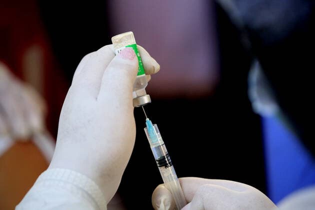March 8, 2021, Kathmandu, Bagmati, Nepal: A health worker prepares a dose of Covishield COVID-19 vaccine to be administered to an elderly person at a hospital in Kathmandu,Nepal on March 8, 2021. Nepal started the nationwide campaign to inoculate the elderly population,over 65 years with with Covishield,the Oxford-AstraZeneca vaccine. Kathmandu Nepal - ZUMAs233 20210308_zap_s233_002 Copyright: xSunilxSharmax