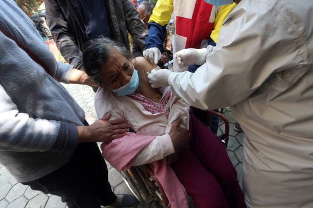 March 8, 2021, Kathmandu, Bagmati, Nepal: An elderly woman receives a dose of Covishield COVID-19 vaccine at a hospital in Kathmandu,Nepal on March 8, 2021. Nepal started the nationwide campaign to inoculate the elderly population,over 65 years with with Covishield,the Oxford-AstraZeneca vaccine. Kathmandu Nepal - ZUMAs233 20210308_zap_s233_005 Copyright: xSunilxSharmax