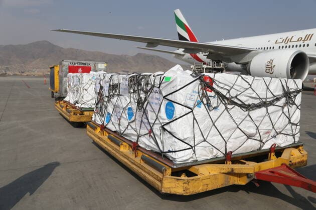 (210308) -- KABUL, March 8, 2021 -- Photo taken on March 8, 2021 shows COVID-19 vaccines from COVAX, an international program devised to help low and middle-income countries to have more access to COVID-19 vaccines, arriving at Hamid Karzai International Airport in Kabul, capital of Afghanistan. (Photo by Xinhua) AFGHANISTAN-KABUL-COVID-19 VACCINE-COVAX SayedxMominzadah 