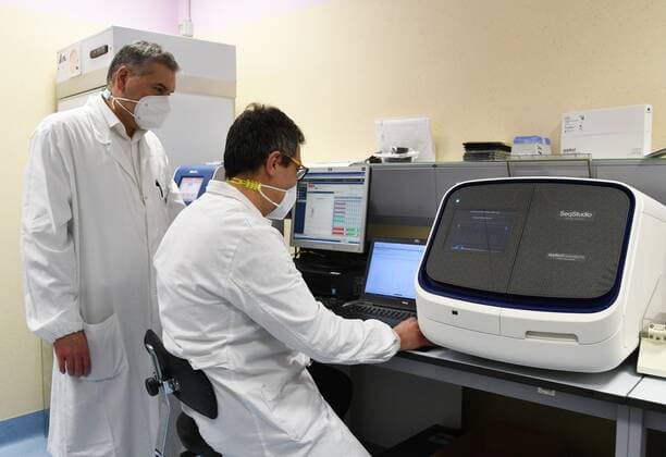 Varese, Italy ASST Sette Laghi Research procedure in the microbiology laboratory led by Prof. Fabrizio Maggi and his team during the reconstruction of the new virus genome with the sequencing of the entire instrumental of the entire spike protein, the part of the Sars CoV- 2 In the photo: Prof. Fabrizio Maggi with researcher during the research analysis  Copyright: xNickxZonnax xIPAx xNickxZonnax