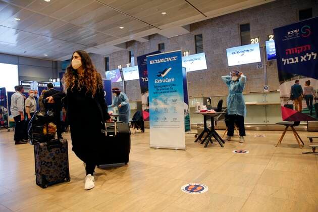(210309) -- TEL AVIV, March 9, 2021 -- A traveler arrives at Ben Gurion International Airport near Tel Aviv, Israel, on March 8, 2021. Israel on Monday lifted the ban on entry of foreign nationals into the country, according to a statement issued by Israel s Population and Immigration Authority. ( via Xinhua) ISRAEL-AIRPORT-COVID-19-CONTROL MEASURES GilxCohenxMagen 