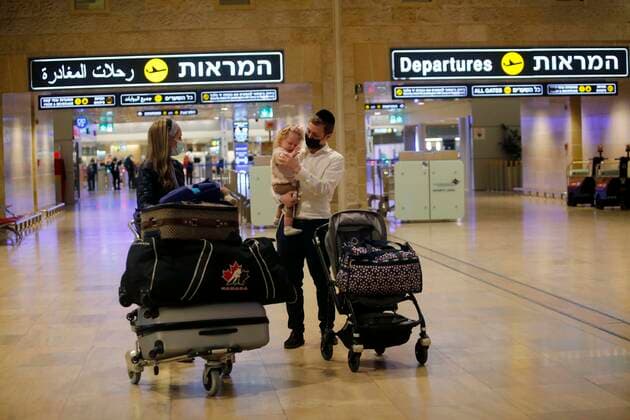 (210309) -- TEL AVIV, March 9, 2021 -- Travelers arrive at Ben Gurion International Airport near Tel Aviv, Israel, on March 8, 2021. Israel on Monday lifted the ban on entry of foreign nationals into the country, according to a statement issued by Israel s Population and Immigration Authority. (Photo by Xinhua) ISRAEL-AIRPORT-COVID-19-CONTROL MEASURES GilxCohenxMagen 